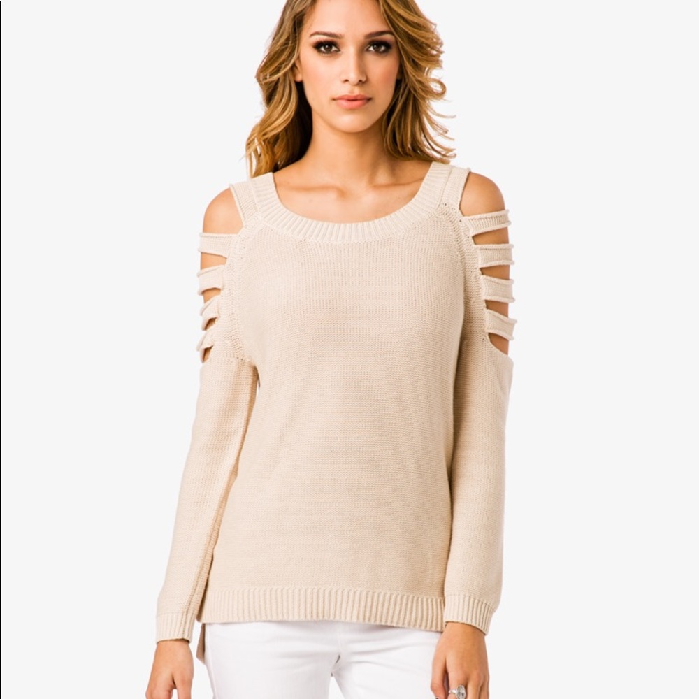 Small shoulder cut out sweater cream color